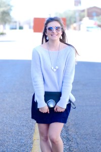 blue sweater and navy skirt
