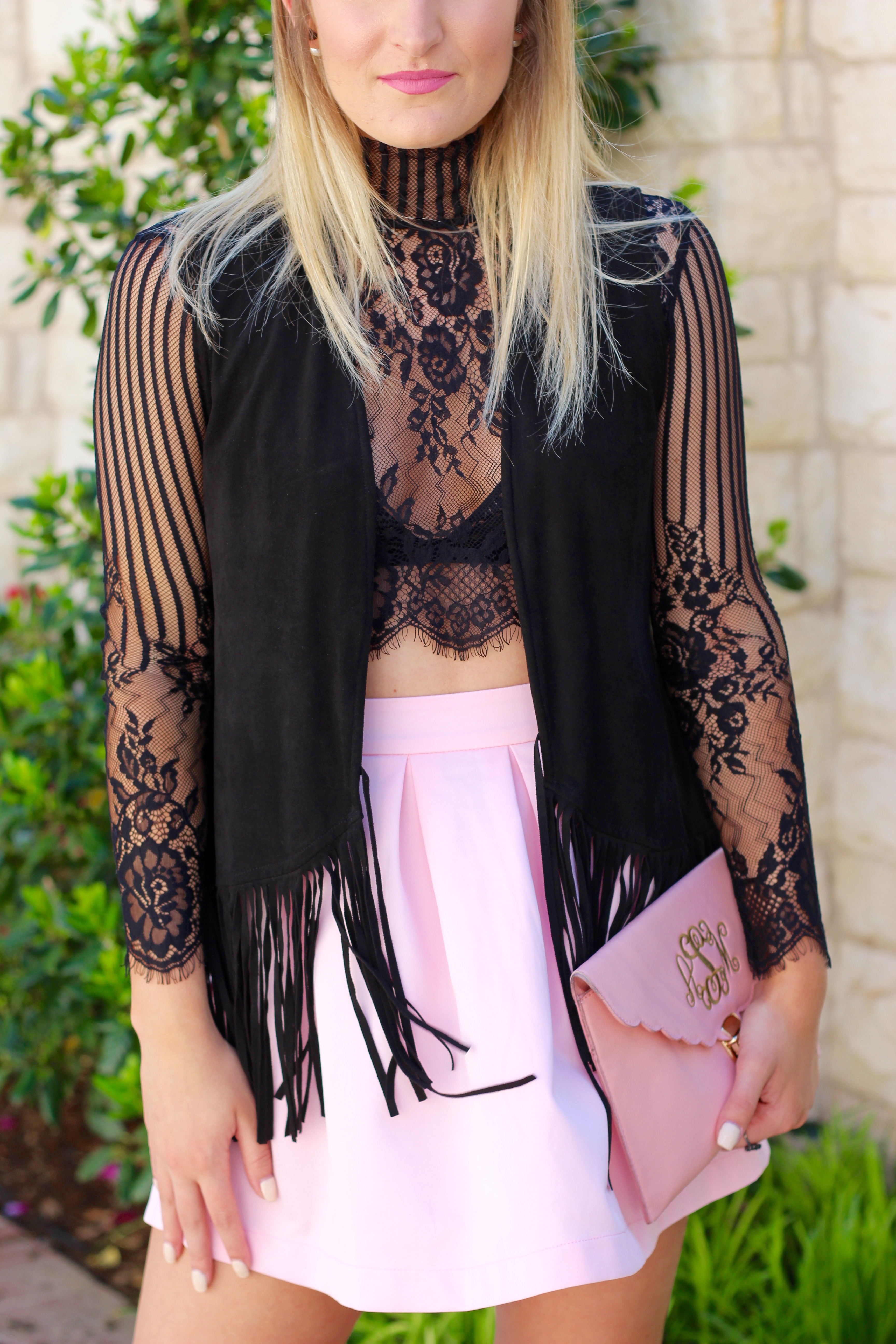 fringe vest with lace top and girly pink skirt - Lingerie Outfit By Day by popular Texas fashion blogger Audrey Madison Stowe