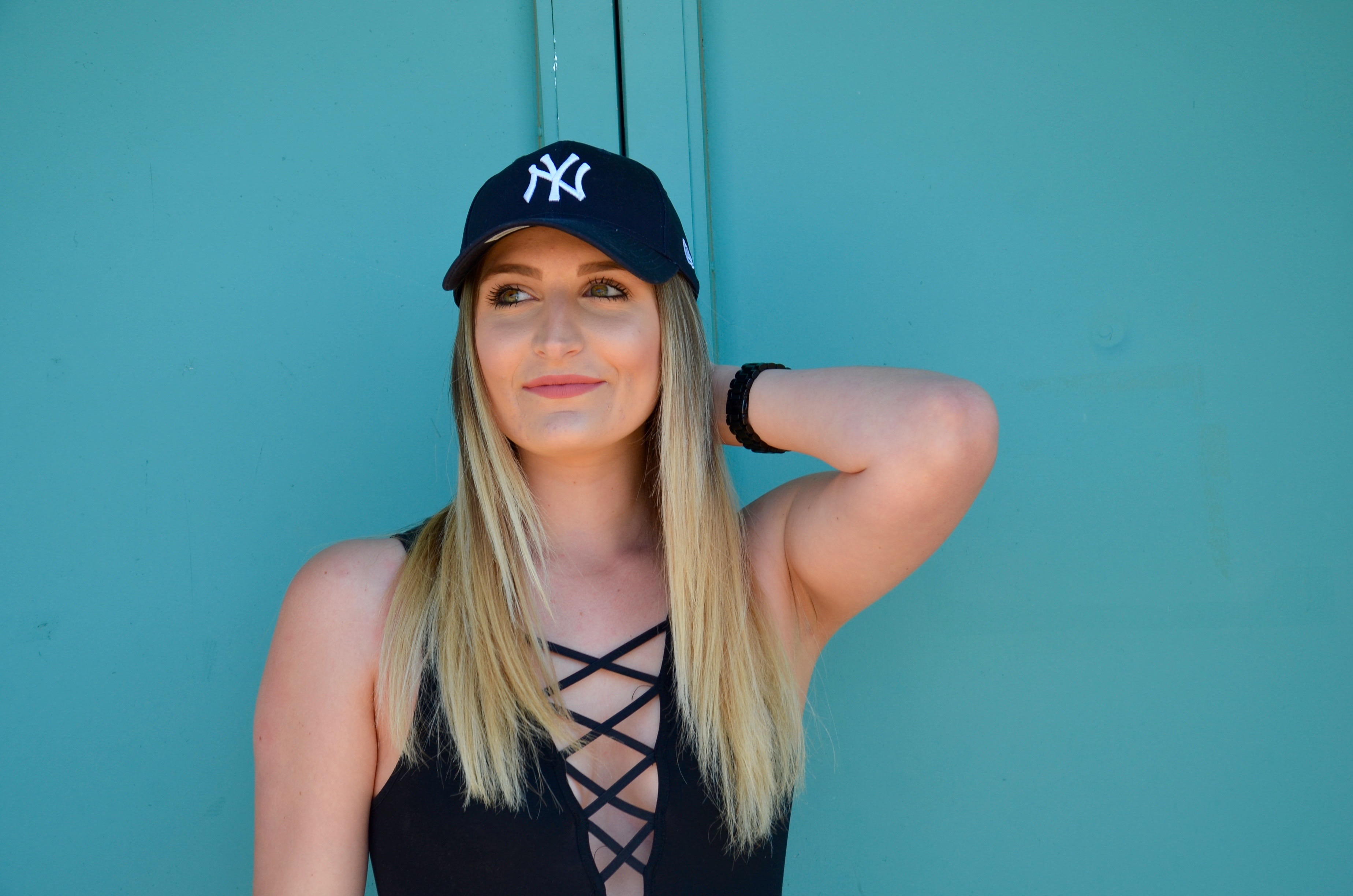 ny yankees baseball cap - Travel Outfit Of The Day by popular Texas style blogger Audrey Madison Stowe