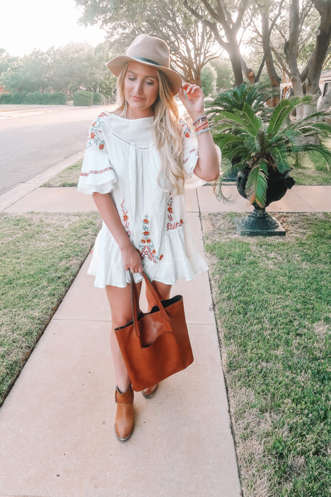 The Floral Embroidered Dress To Transition You To Fall featured by popular Texas fashion blogger Audrey Madison Stowe