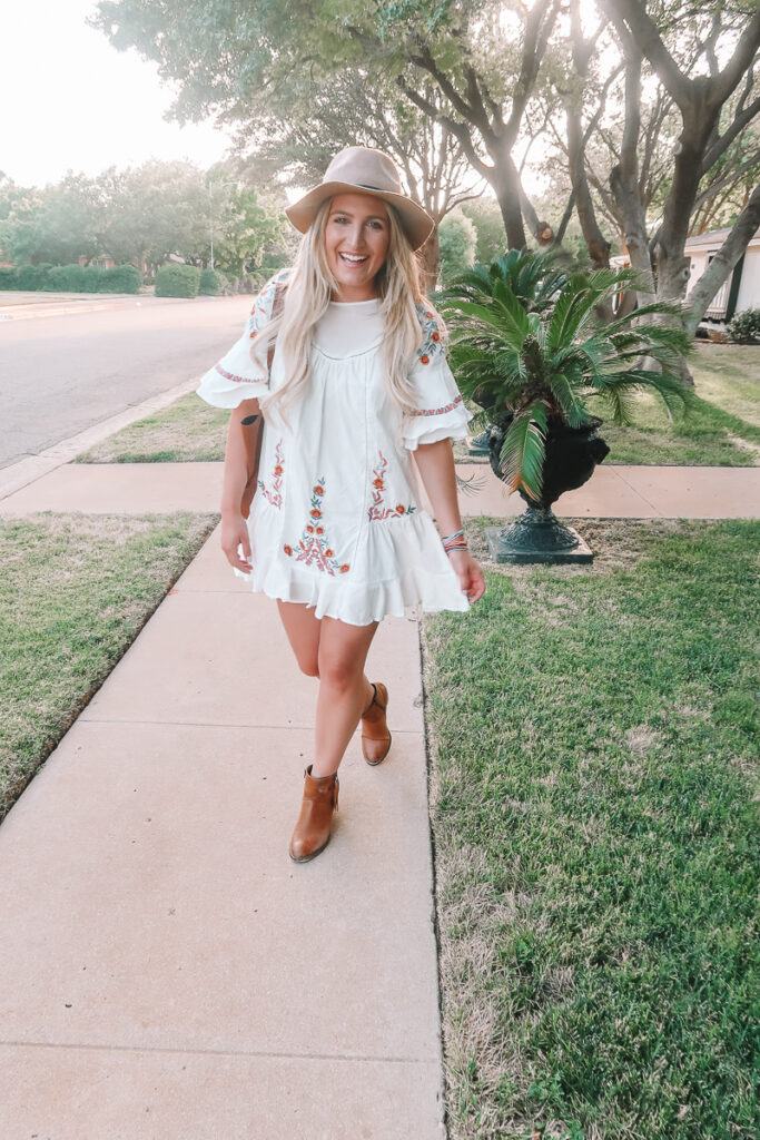 The Floral Embroidered Dress To Transition You To Fall featured by popular Texas fashion blogger Audrey Madison Stowe