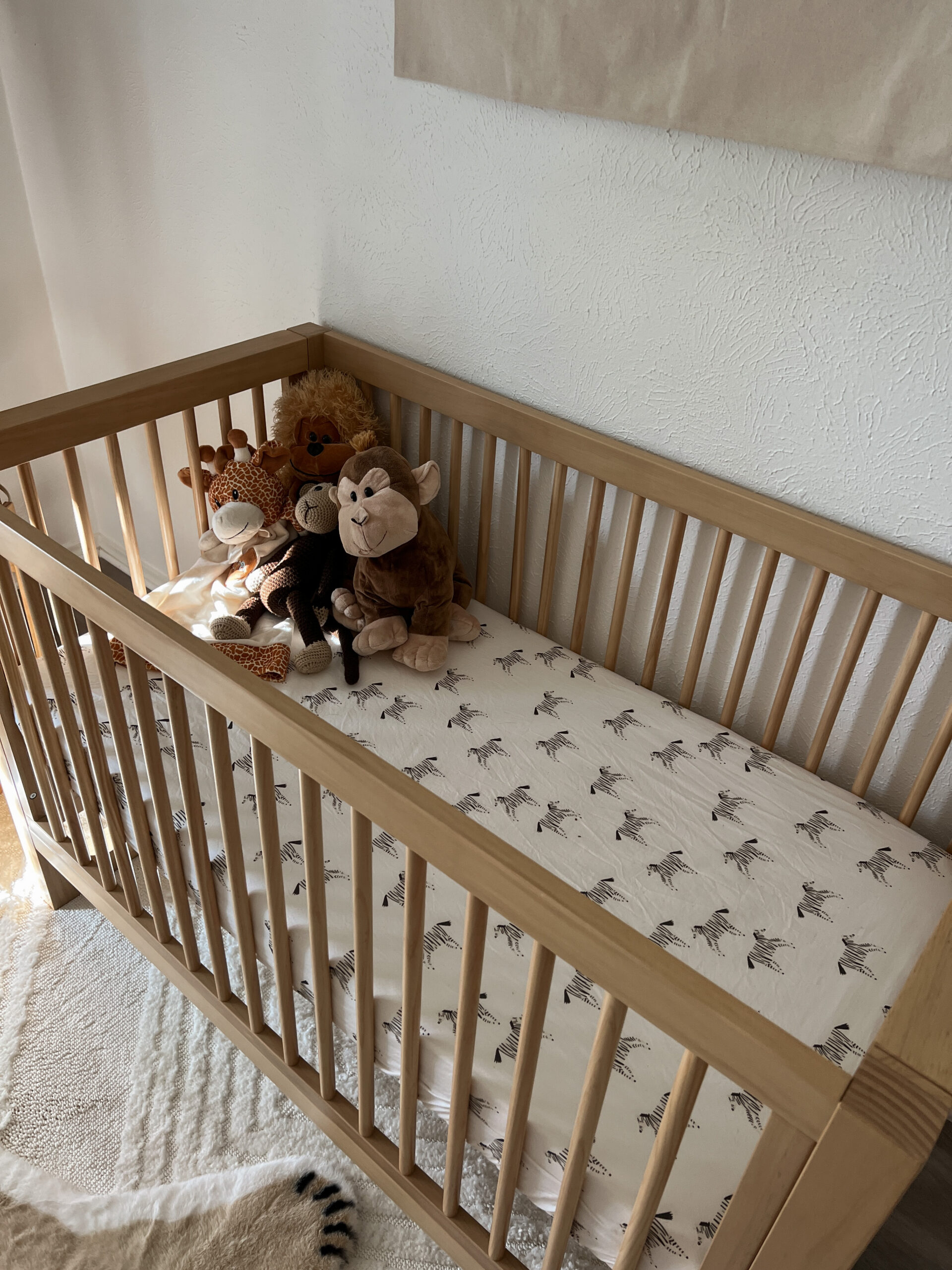 Crib details for a neutral nursery | Audrey Madison Stowe 